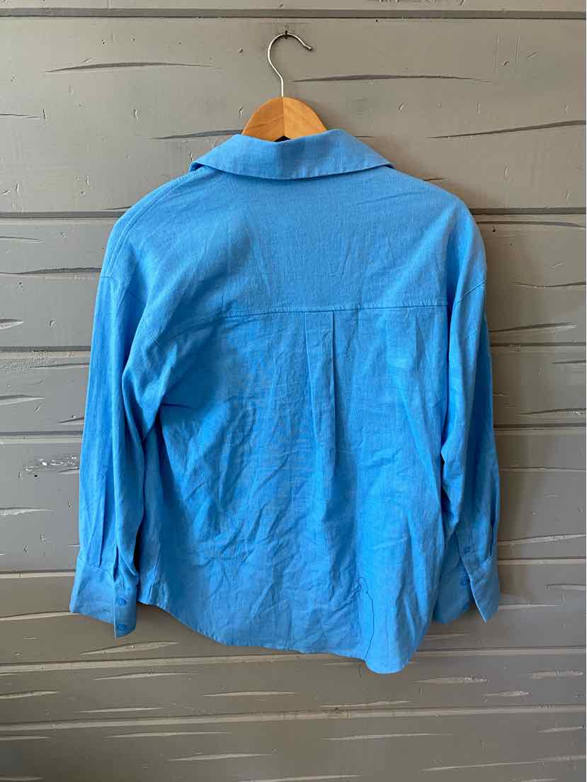 Light blue long-sleeve button-up shirt with a spread collar and solid color, size XS.