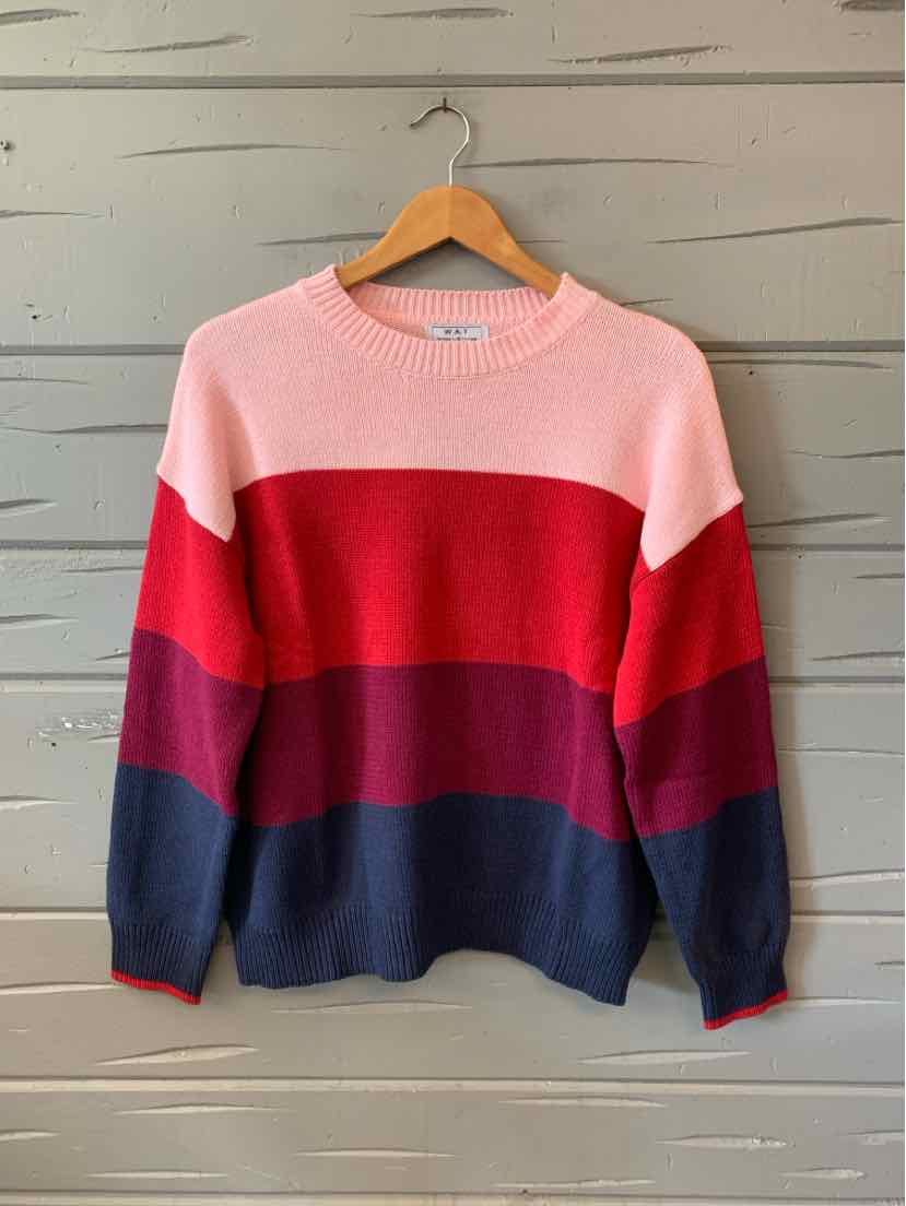 Color-blocked sweater with horizontal stripes in pink, red, burgundy, and navy, crew neck, long sleeves, knitted fabric.