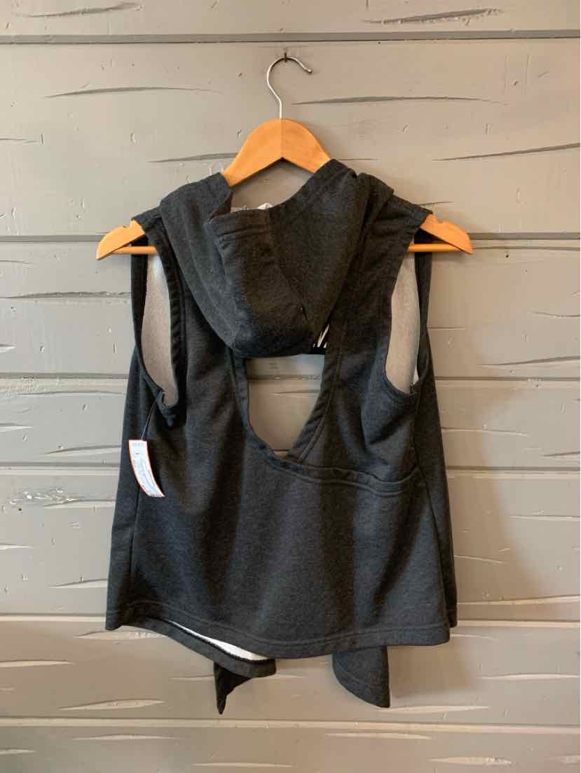 Black sleeveless athletic tank top with hood and open back from Nike, medium size.
