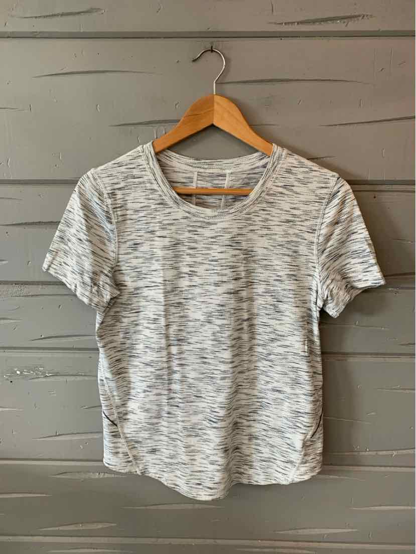 Light gray marled short-sleeve athletic top with scoop neck and relaxed fit on wooden hanger.
