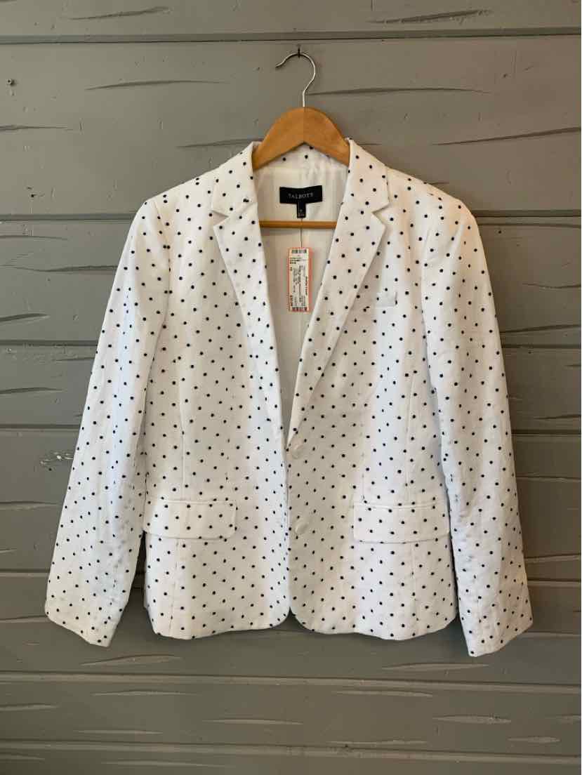 White blazer with black polka dots, notch collar, single-button closure, long sleeves, tailored fit.