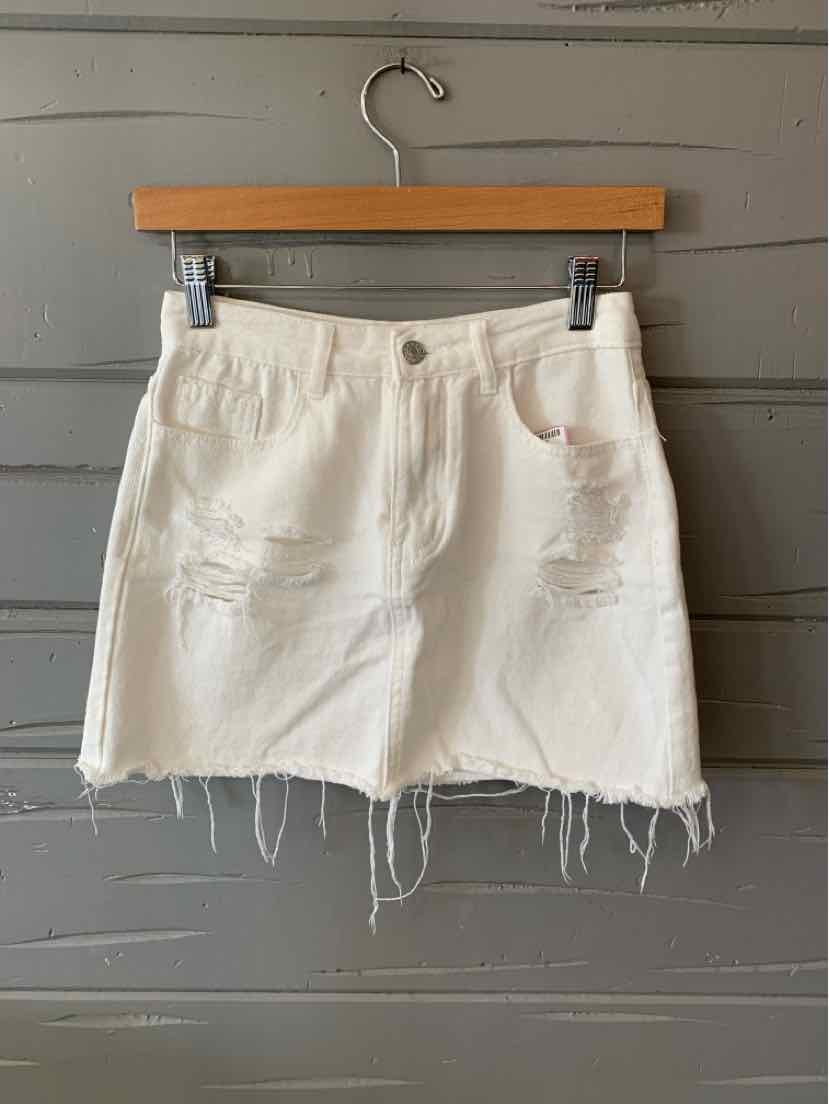 White distressed denim mini skirt with frayed hem and front pockets, size small.
