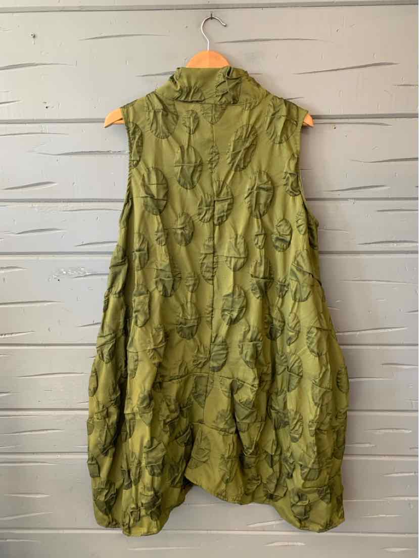 Olive green sleeveless tunic with a high collar, botanical print, and gathered, draped sides.