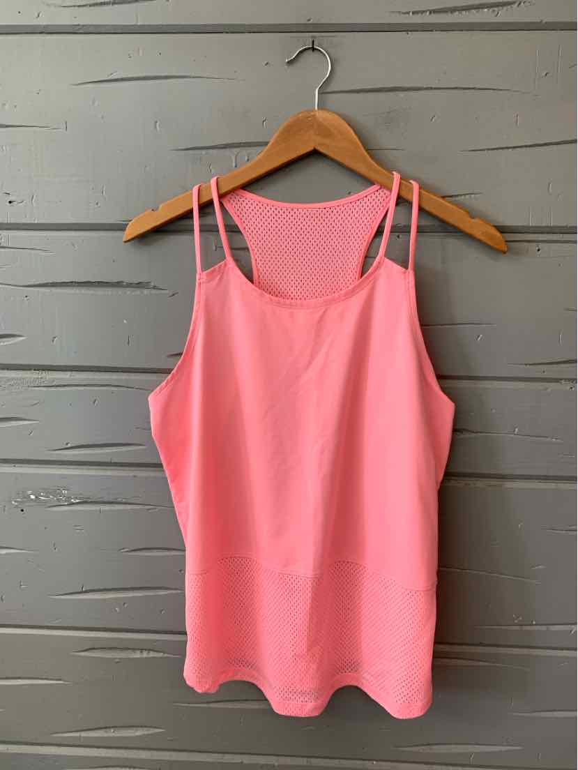 Pink sleeveless athletic tank top with double thin straps and scoop neckline, hanging on wooden hanger.