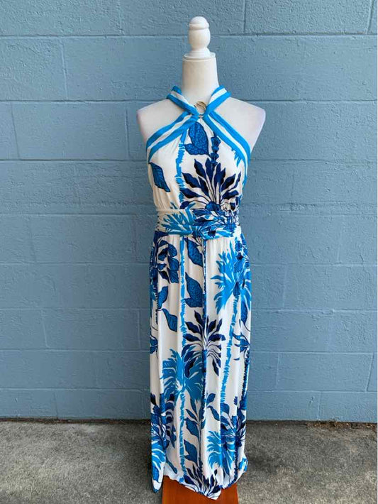 Sleeveless halter neck maxi dress in white with blue and navy tropical leaf print and waist tie belt.