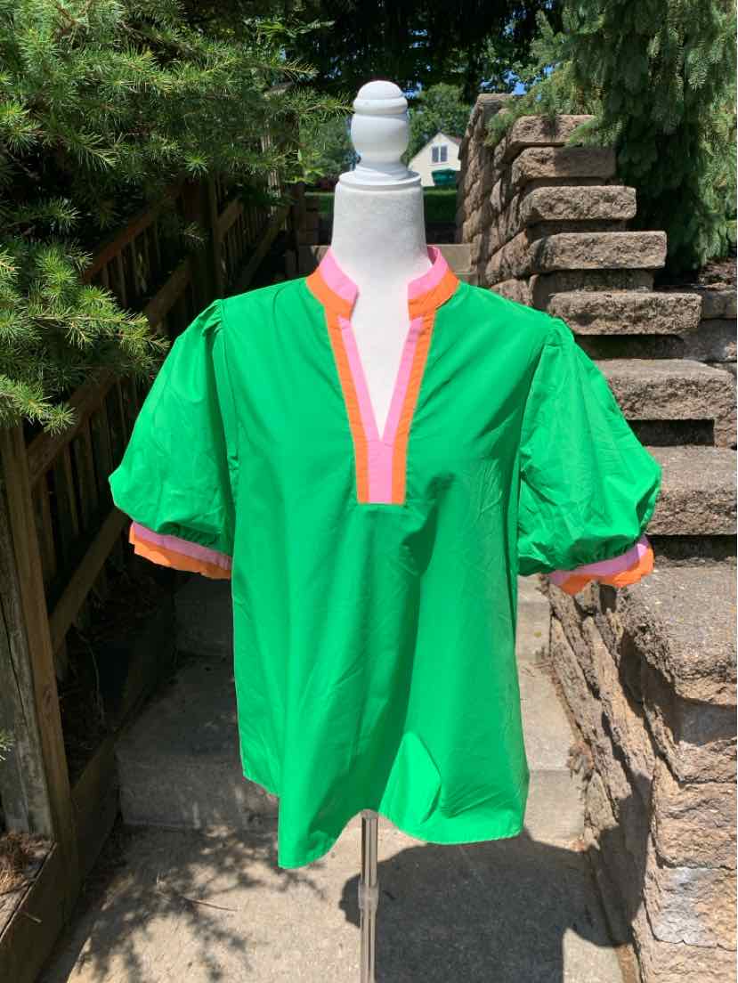Bright green short-sleeve blouse with loose fit, pink and orange trim on collar and sleeves, lightweight fabric.