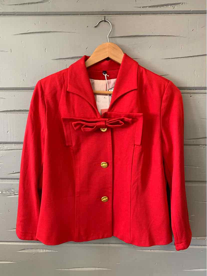 Red blazer with gold buttons and a tied bow at the collar, size 6.