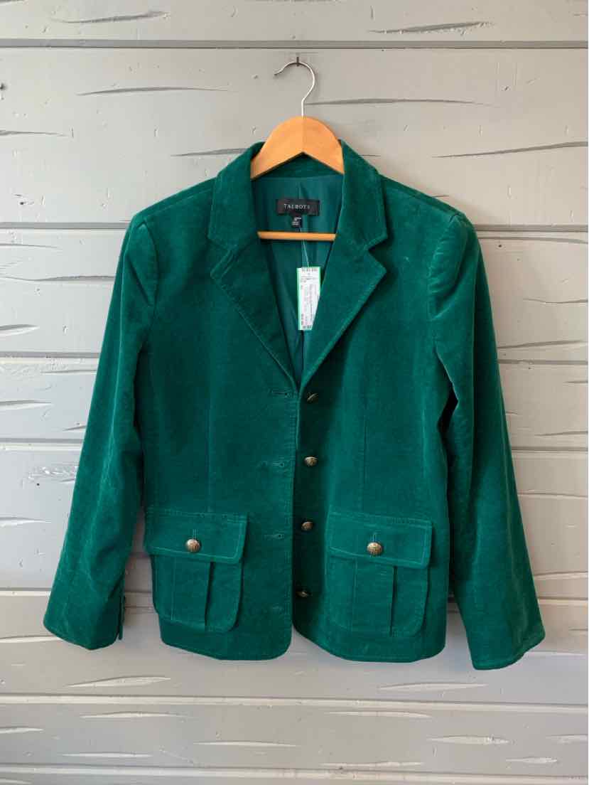 Emerald green velvet blazer with notched collar, gold buttons, and front flap pockets.