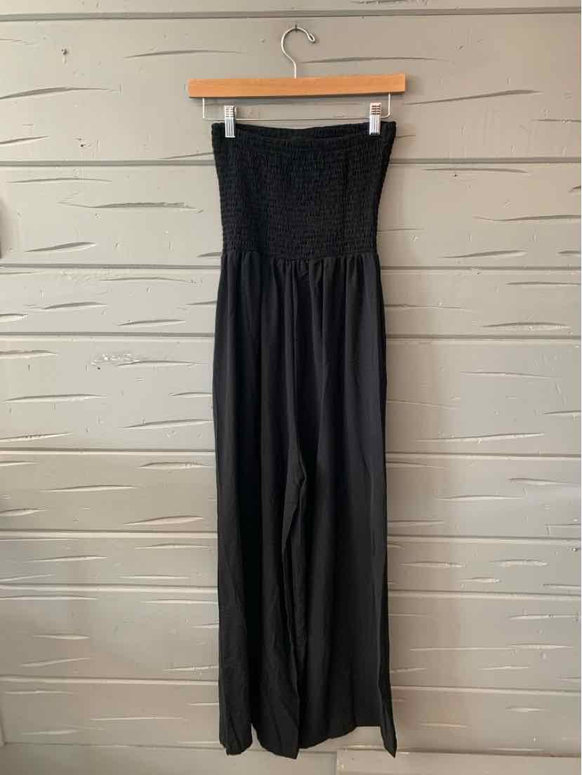 Black sleeveless wide-leg jumpsuit with ruched bodice and strapless neckline.