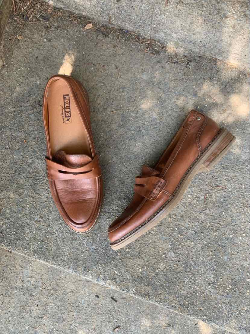 Brown leather loafers with a moc toe design and low stacked heel, size 41.