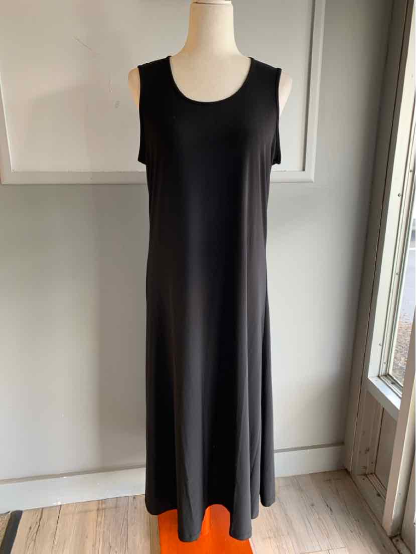 Black sleeveless long dress with scoop neckline and flowy silhouette displayed on mannequin.