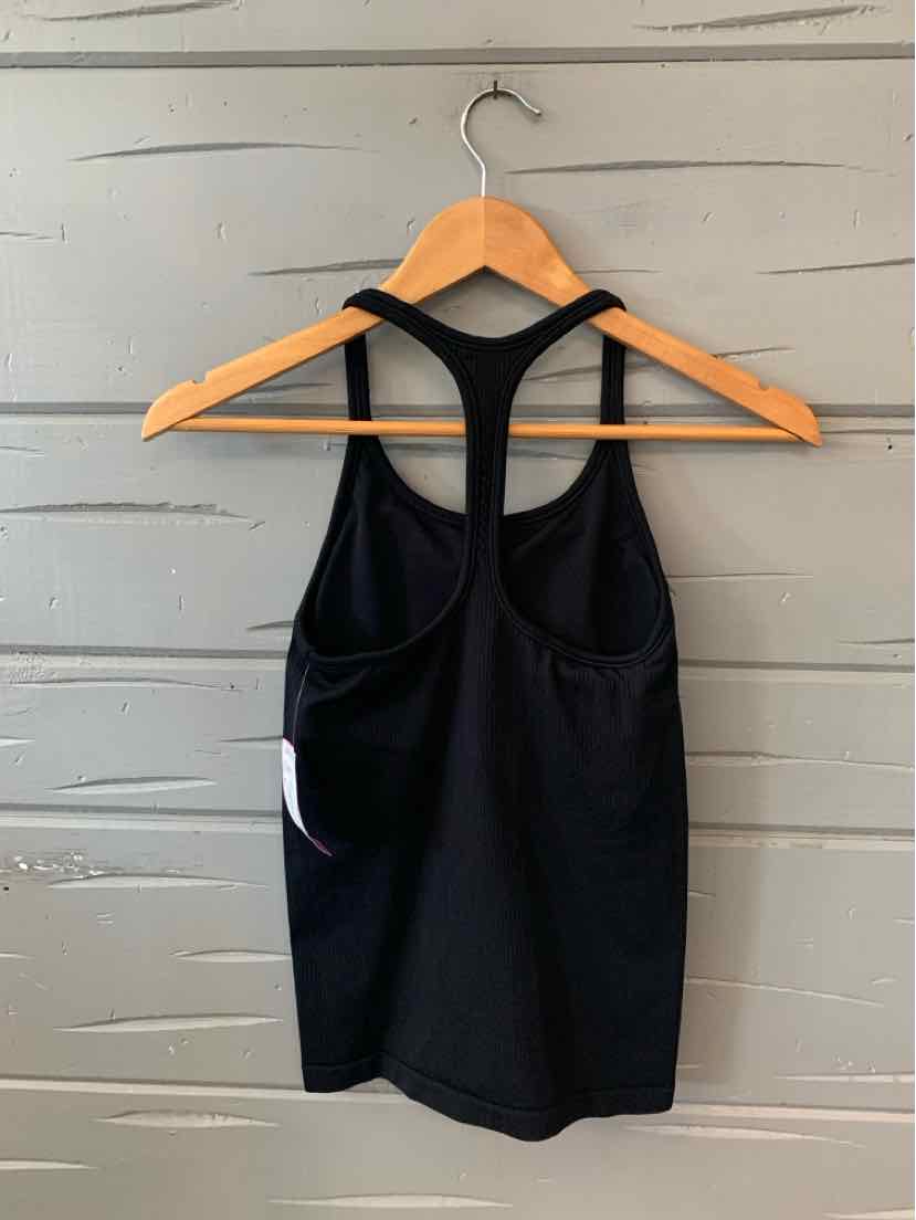 Black racerback athletic tank top in size XS with a fitted silhouette on wooden hanger.