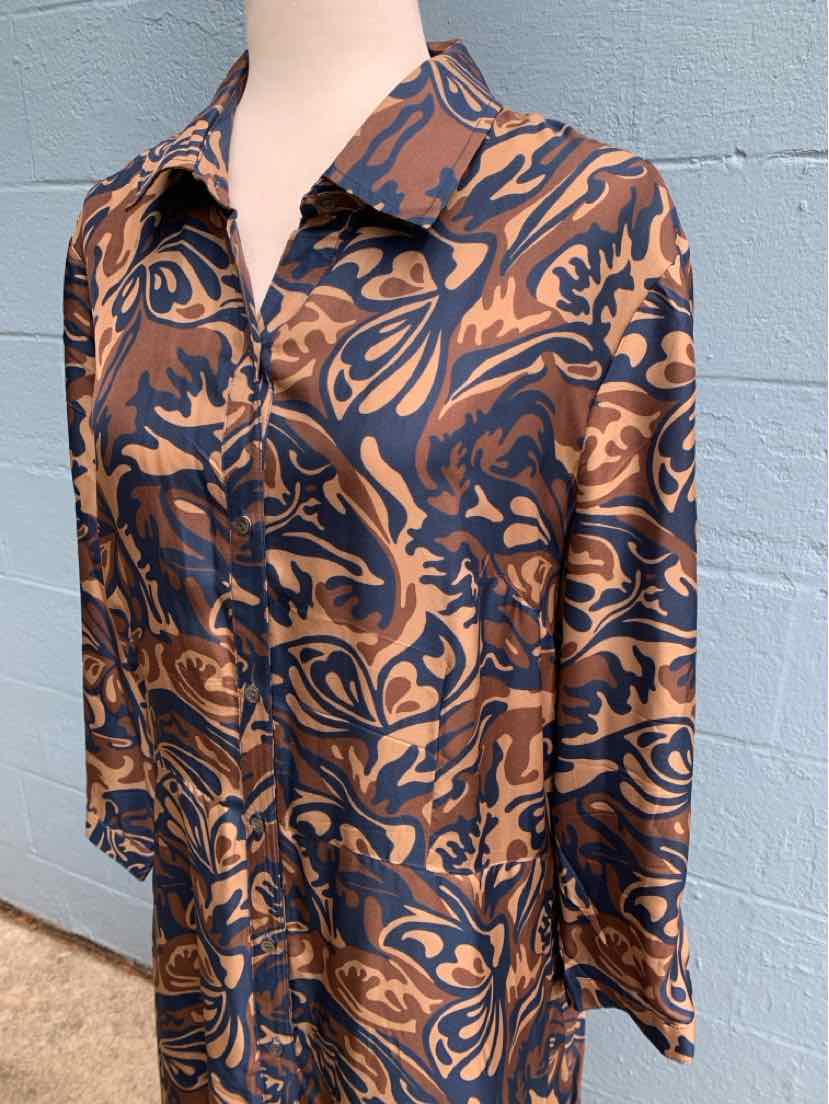 Men's long-sleeve shirt in brown and black paisley pattern with button-down collar and chest pocket.
