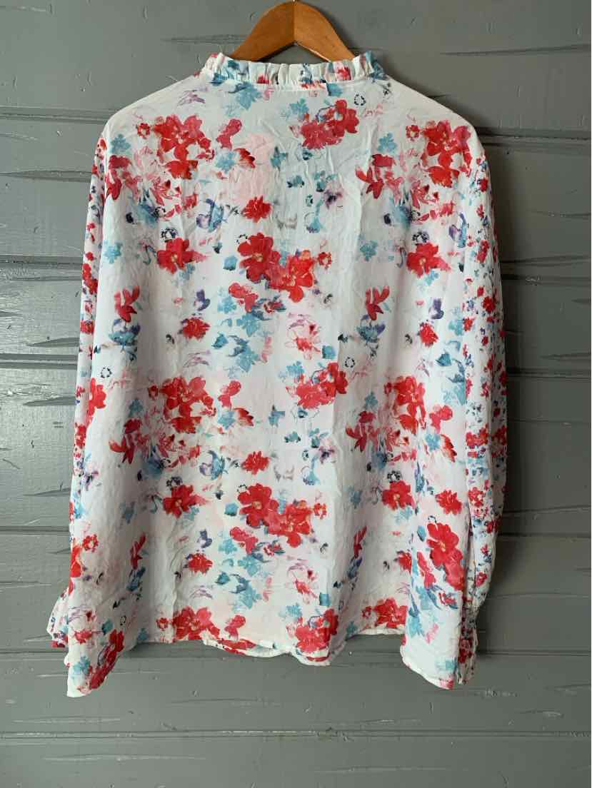 White long-sleeve blouse with red and blue floral print, size 2XL, hanging on wooden hanger.