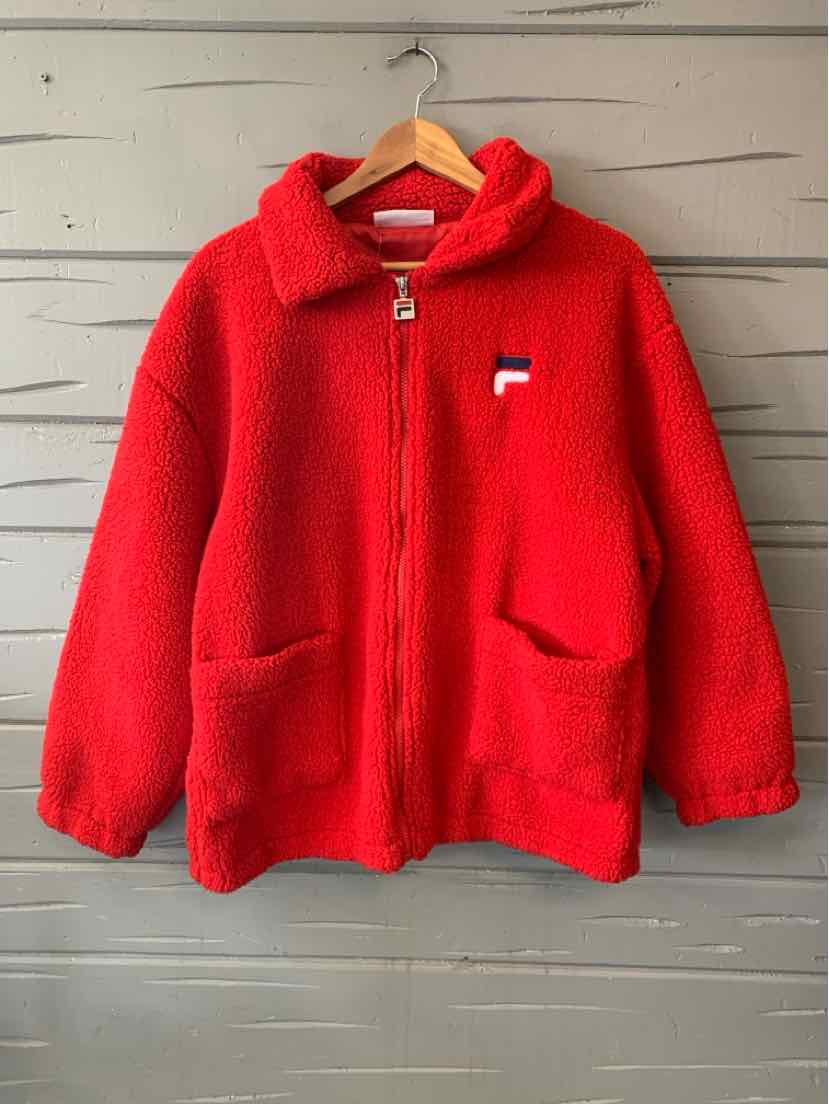 Red FILA fleece jacket with a full zip, high collar, long sleeves, and two front pockets.