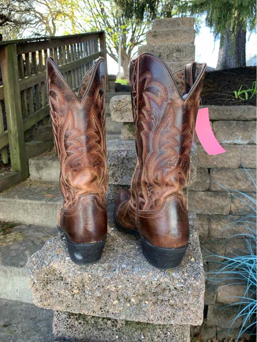 Brown leather Laredo western boots with intricate stitching and stacked heels, size 8.