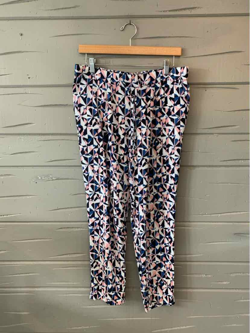 Slim-fit pants with blue, white, and pink abstract floral pattern on lightweight fabric.