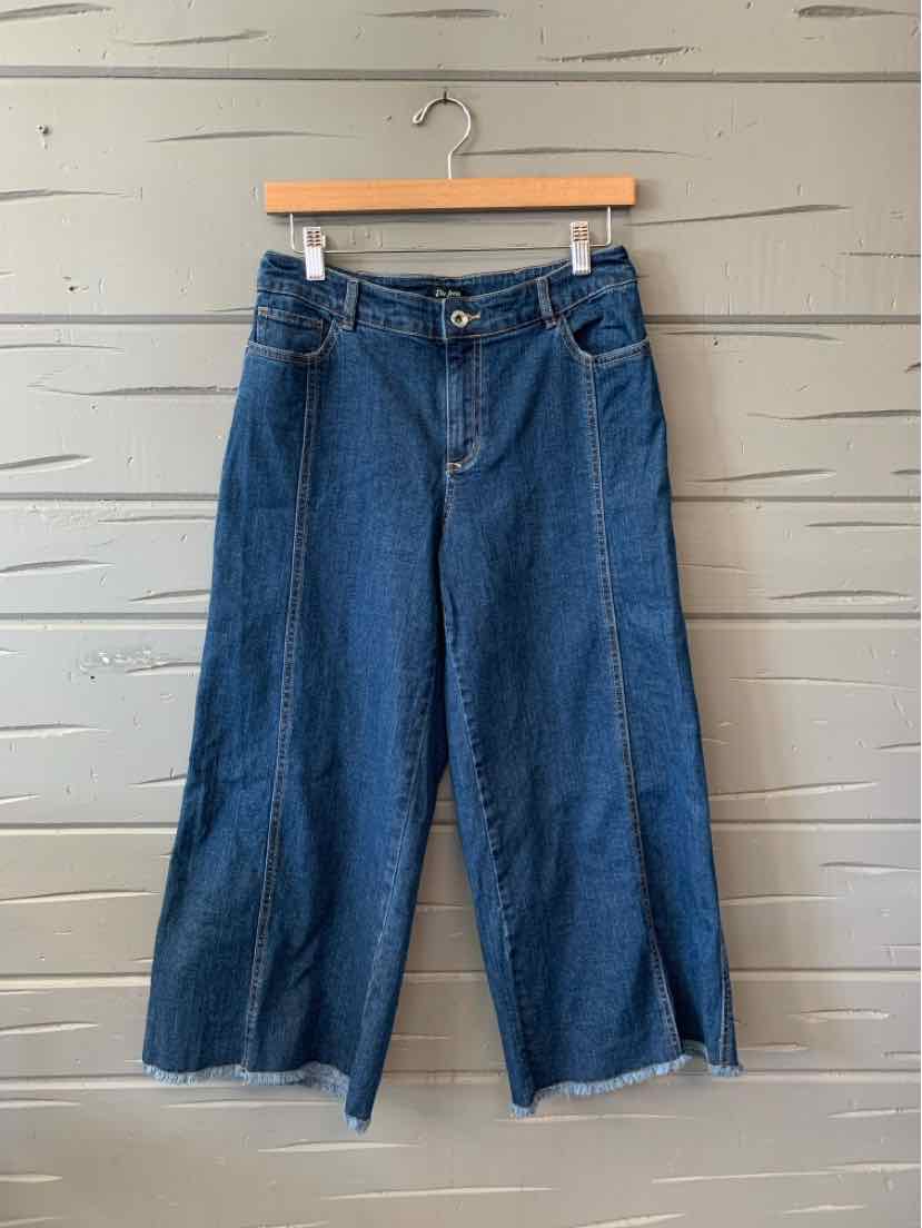 High-waisted wide-leg blue denim jeans with raw hem and front button closure, size 8.