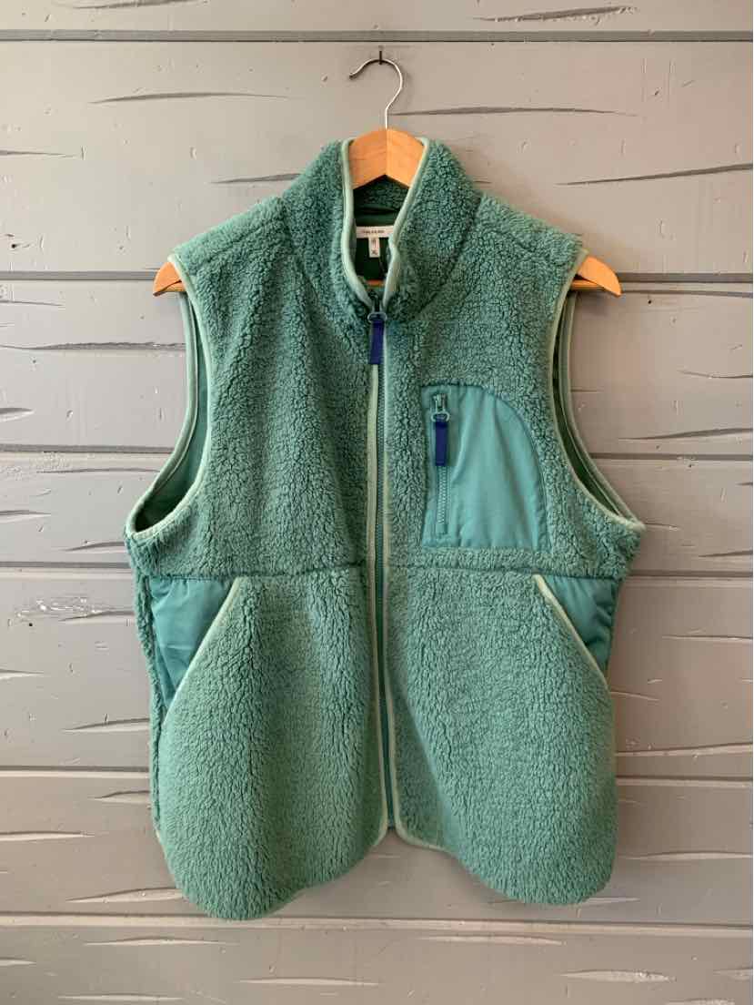 Women’s sage green sherpa fleece vest with a full zip, stand collar, and teal chest pocket.