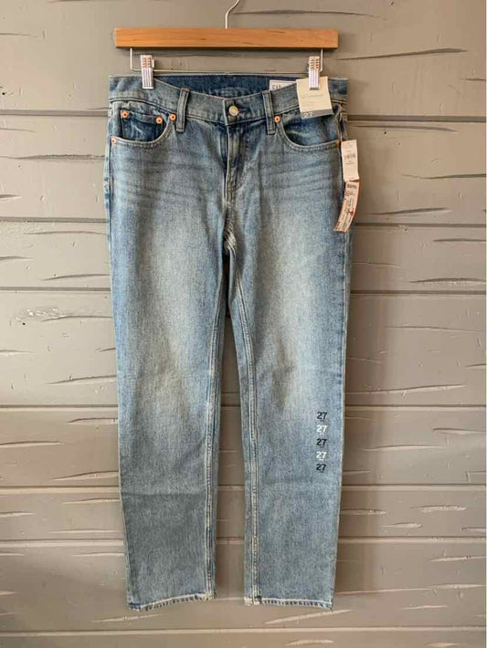 Light blue denim jeans with faded wash, straight leg fit, five-pocket style, and button fly closure.
