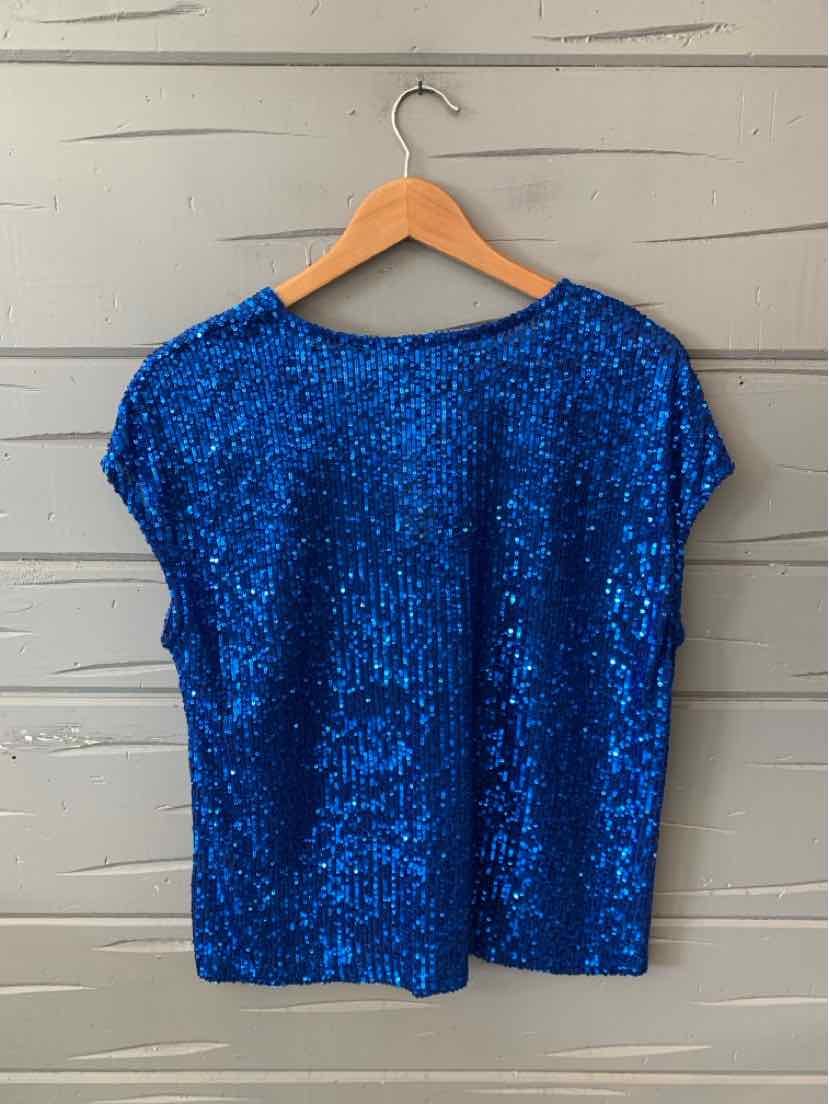 Bright blue short-sleeve top fully covered in shiny sequins with a round neckline.