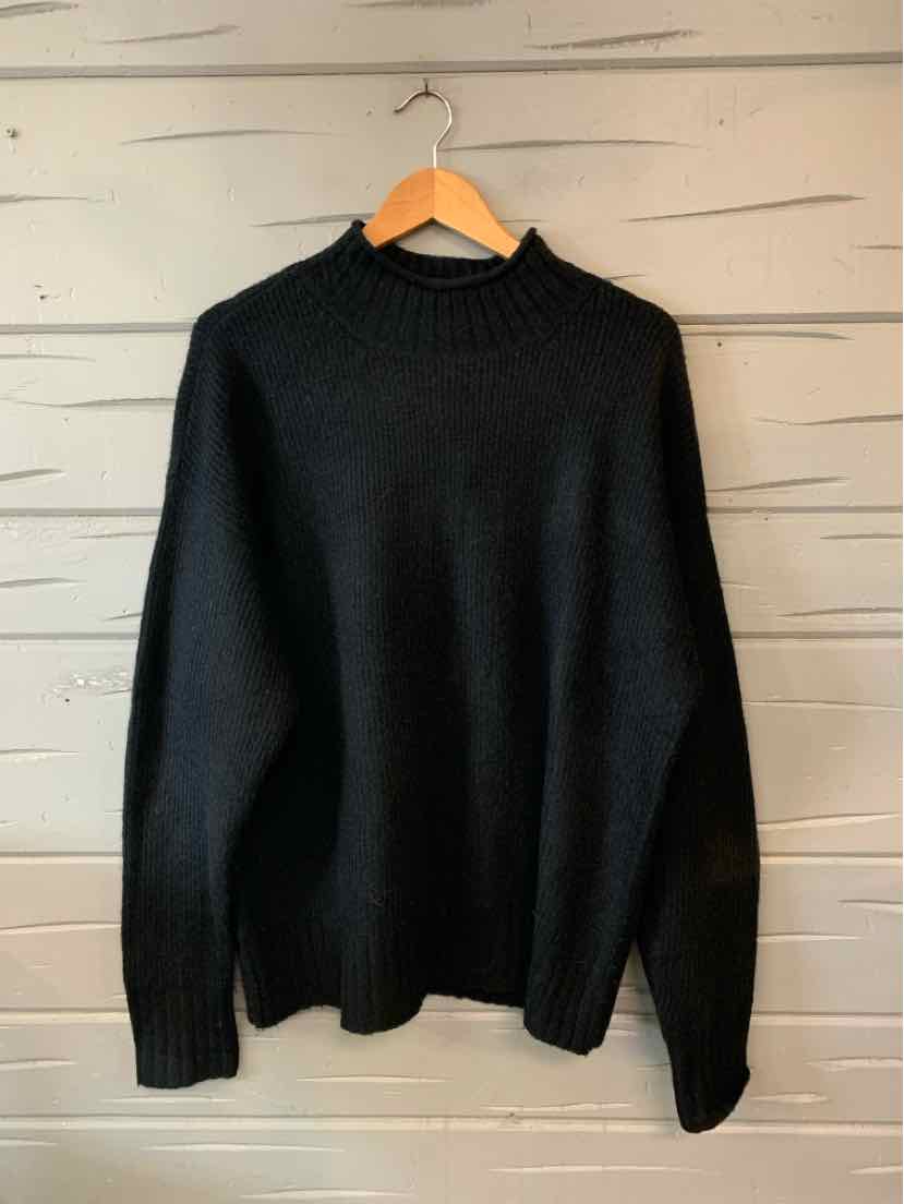 Black oversized knit sweater with high ribbed collar and long sleeves, size XL.