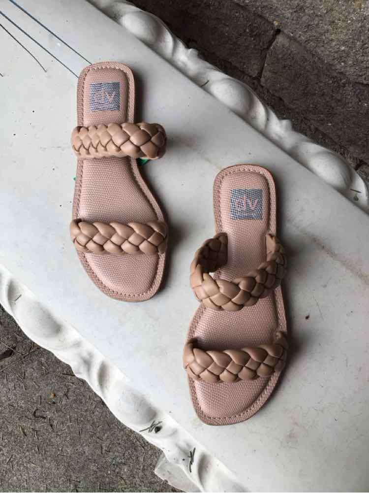 Nude flat sandals with two braided straps and cushioned footbed, size 7.