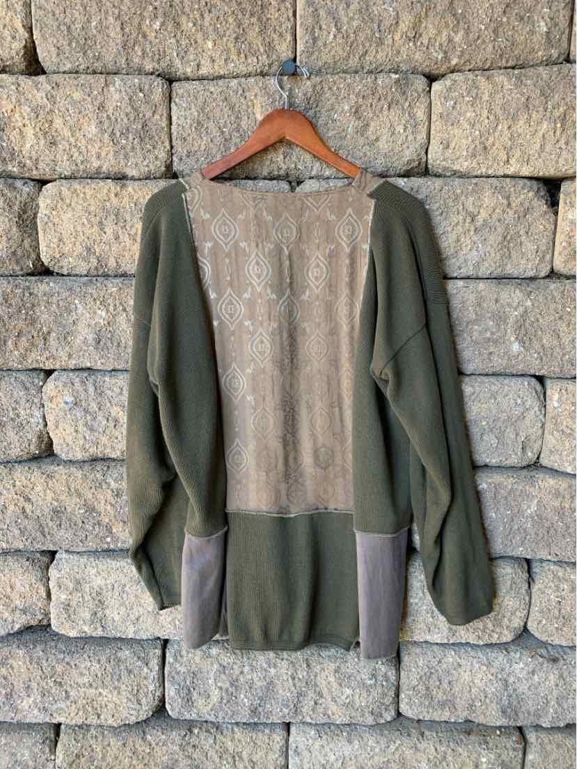 Two-piece women’s home frock set with a beige patterned top, dark olive sleeves, and matching skirt.