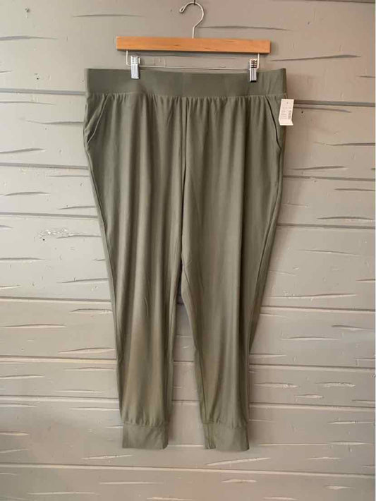 Olive green relaxed-fit pants with an elastic waistband and cuffed ankles, size XL.