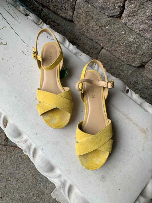 Yellow suede open-toe ankle strap sandals with crisscross front straps, size 7.5.