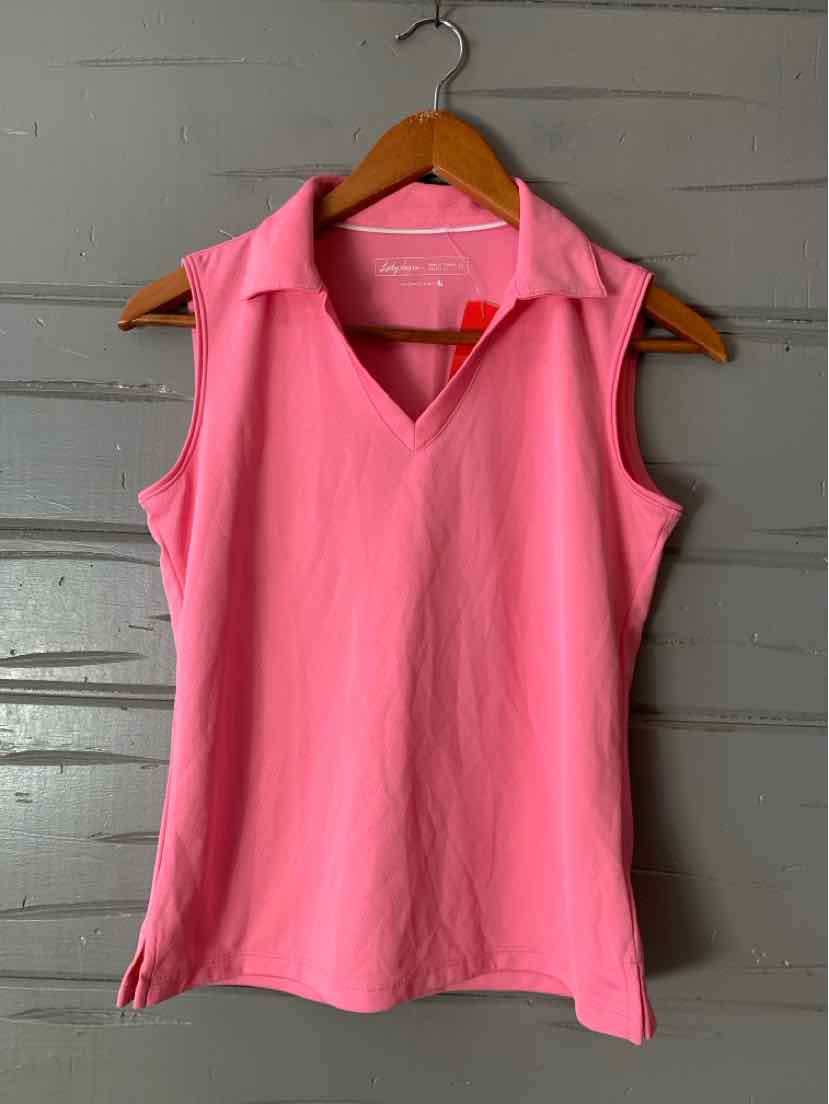 Sleeveless pink polo shirt with collar and side slits on wooden hanger against gray wooden background.