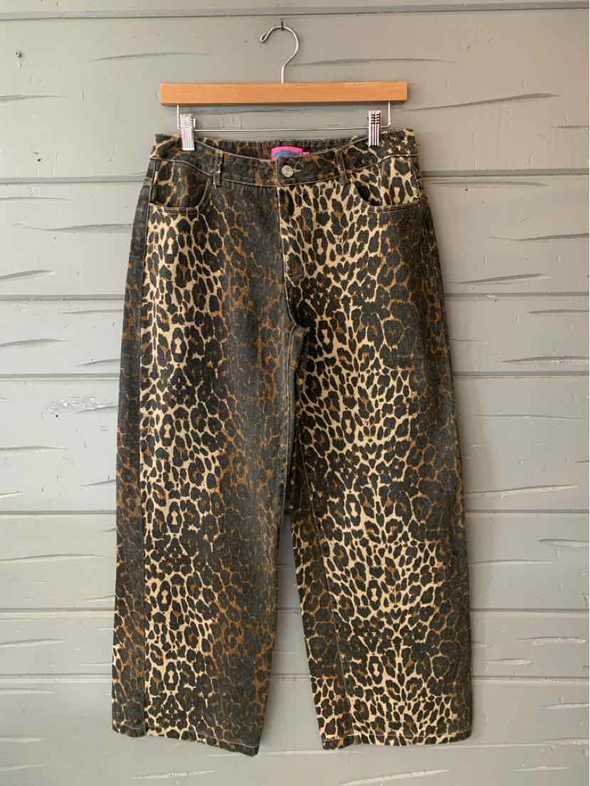 Brown and black cheetah-print wide-leg pants with a high waist and belt loops.