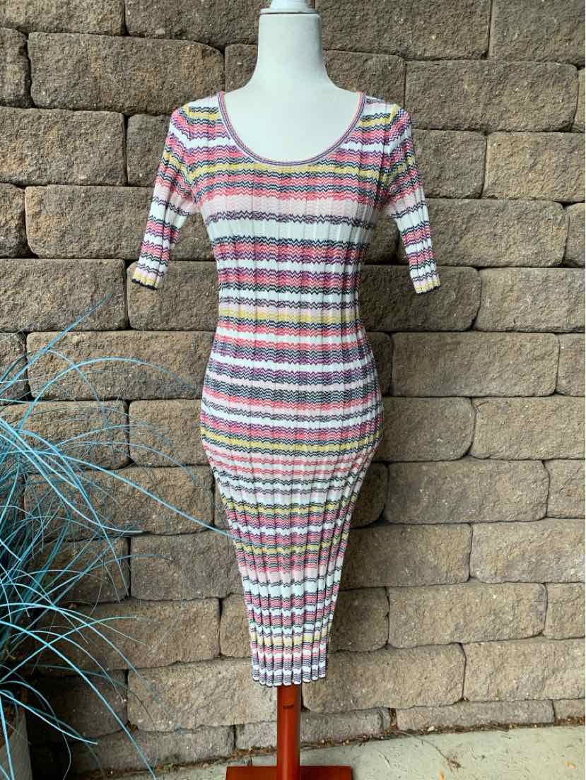 Fitted multicolored striped knit dress with elbow-length sleeves and midi hem.
