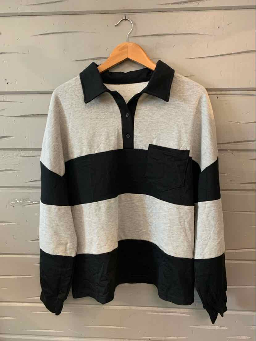 Long-sleeve rugby shirt with wide black and gray stripes, black collar, and chest pocket.
