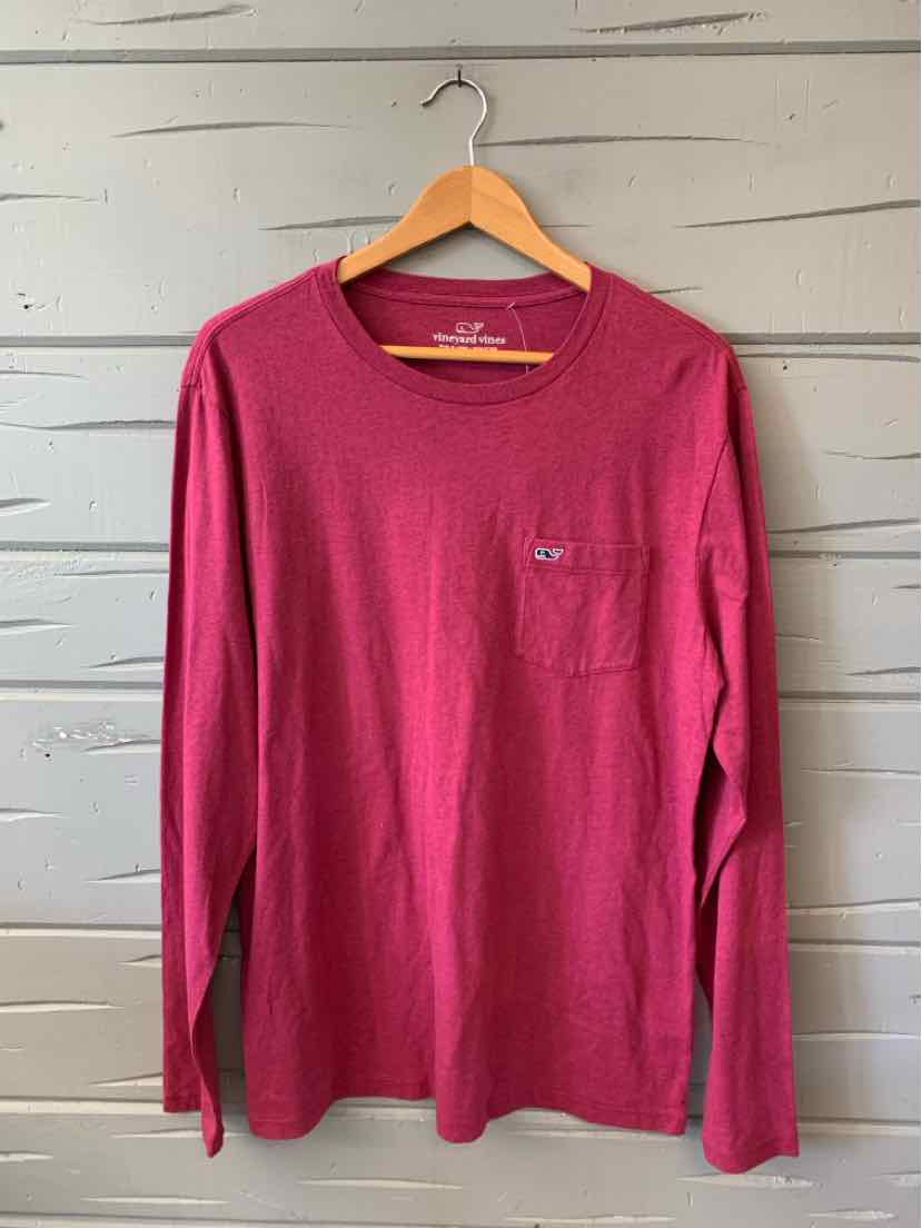 Long-sleeve burgundy crewneck shirt with left chest pocket and soft cotton fabric.