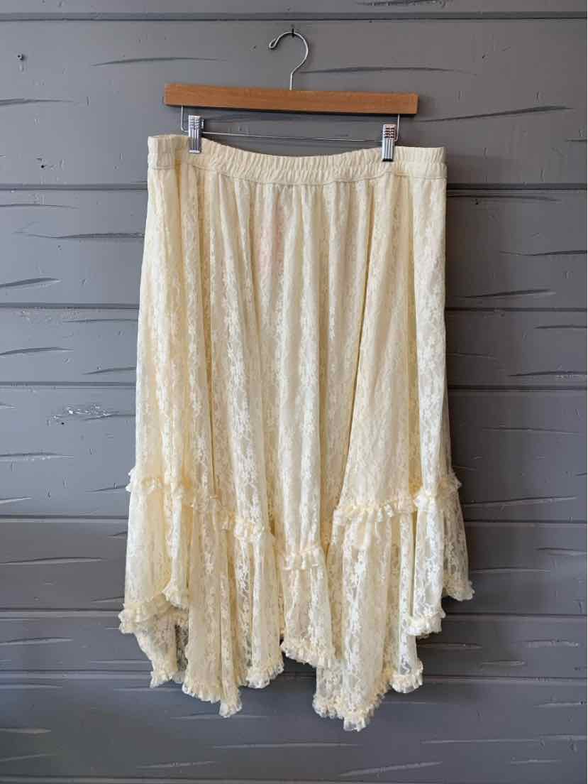 Cream-colored lace skirt with asymmetrical hem and gathered waist, size XL.