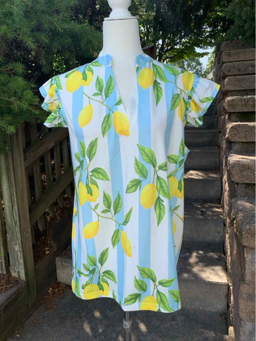 White sleeveless blouse with lemon and green leaf print, size large, lightweight fabric.