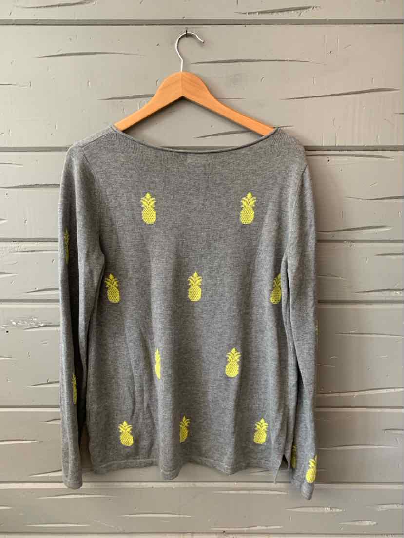 Long-sleeve gray sweater with scattered yellow pineapple prints, crew neckline.