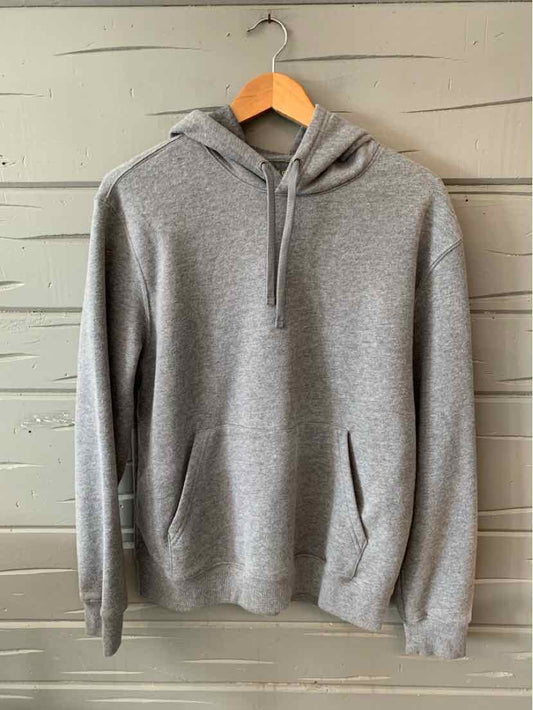 Light gray medium hoodie with front kangaroo pocket and adjustable drawstring hood.