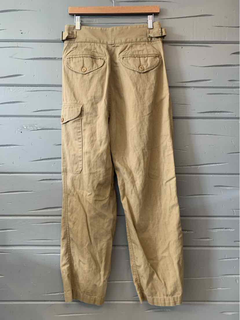 Tan cargo pants with elastic cuffs, back flap pockets, and side utility pocket in lightweight fabric.