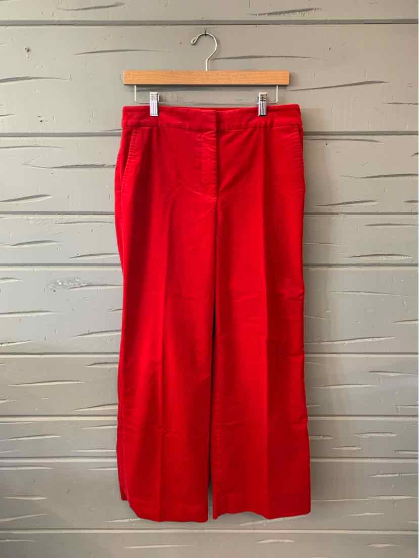Bright red velvet wide-leg pants with front pleats and a waistband in size 8P.