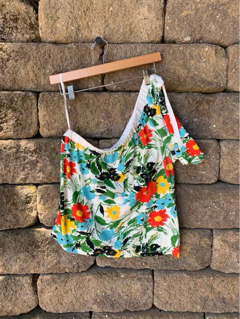 Floral off-shoulder blouse with vibrant red, green, and blue flowers on white background, size small.