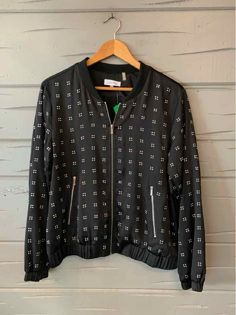 Black bomber jacket with silver studded square pattern, zipper closure, and ribbed cuffs and hem.