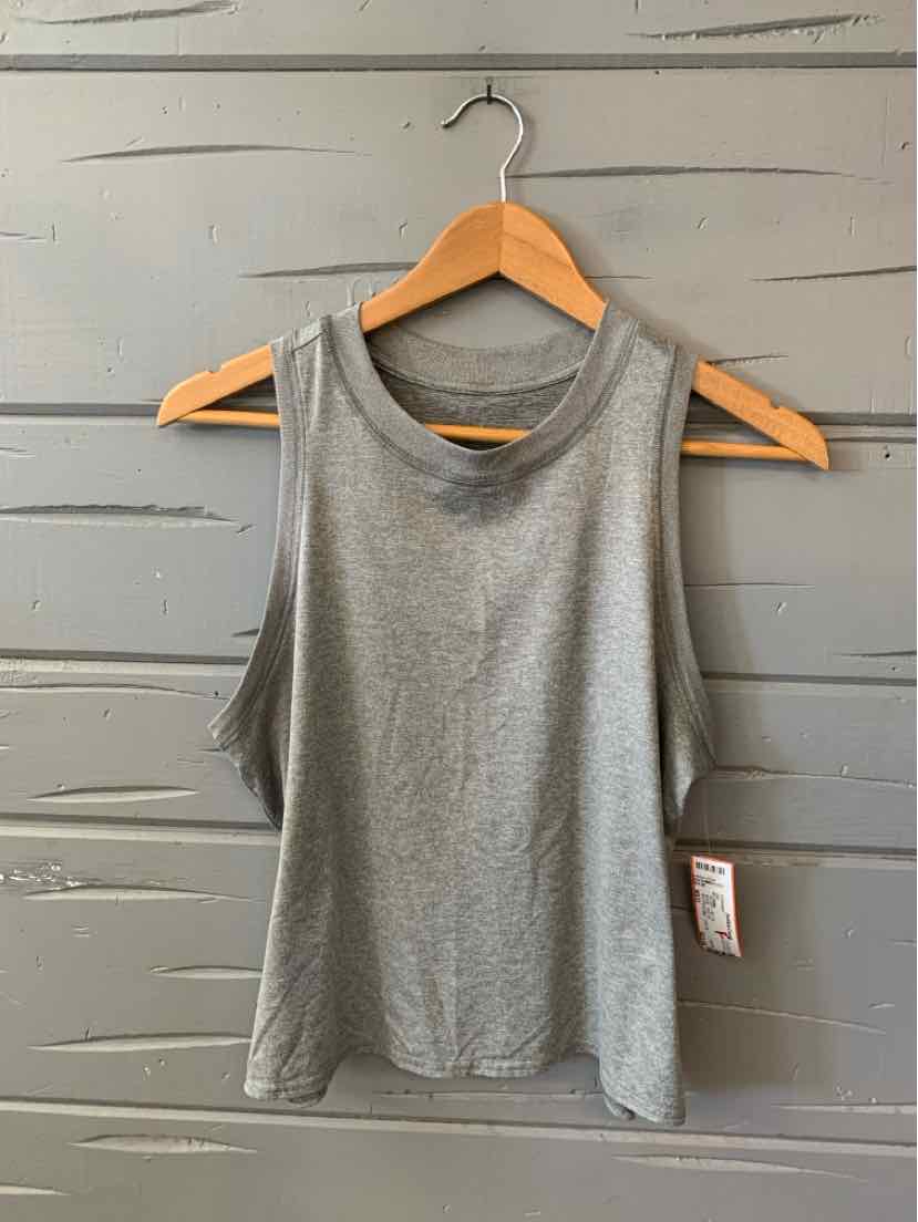 Gray sleeveless athletic tank top with crew neck, lightweight fabric, and straight hem.