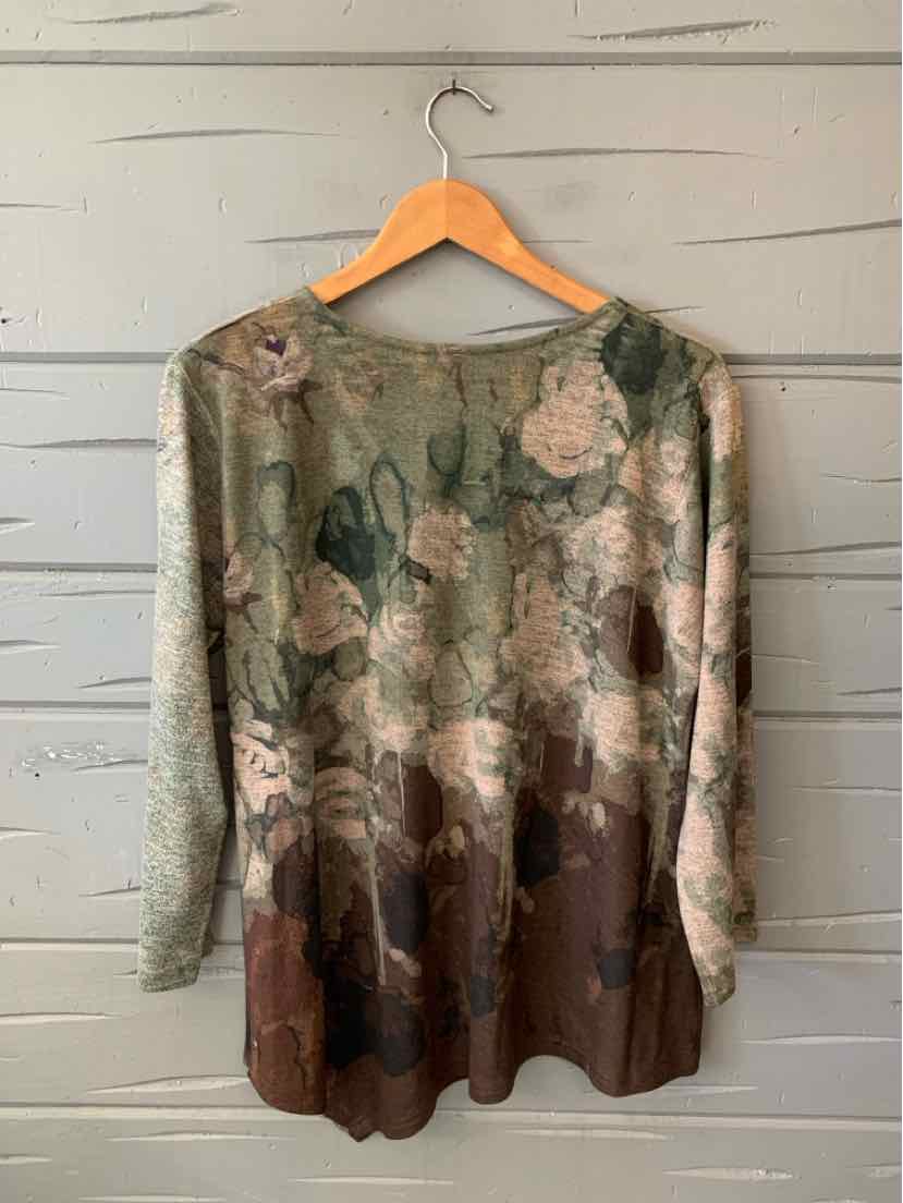 Women's long-sleeve tunic with an earthy floral and cubist pattern, fading to a dark brown hem.