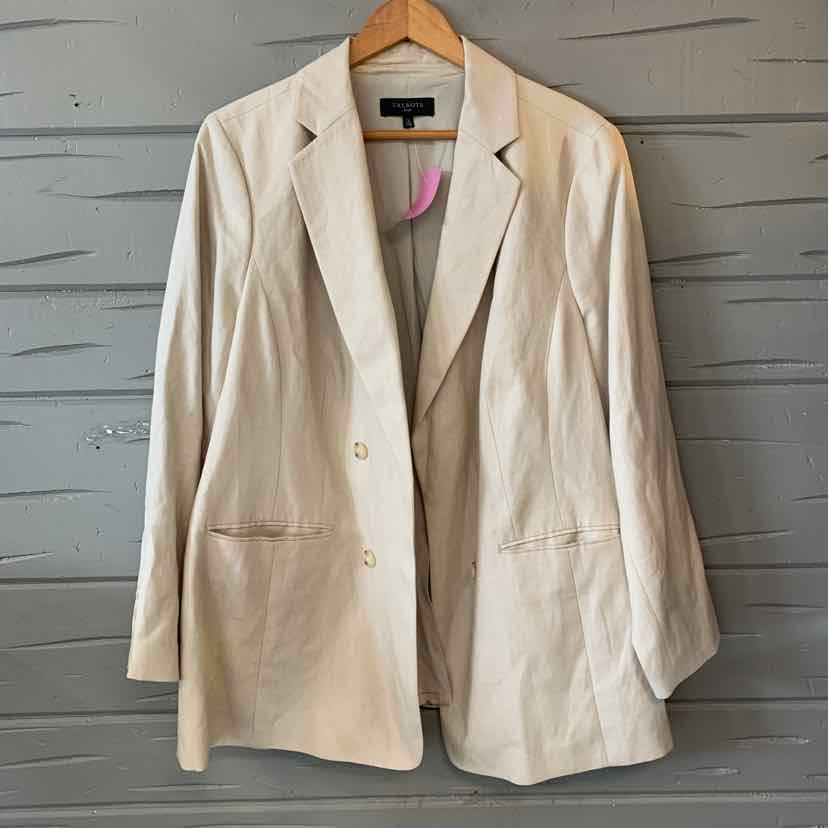 Tan long blazer with notch lapels, two front buttons, and flap pockets in a soft fabric.