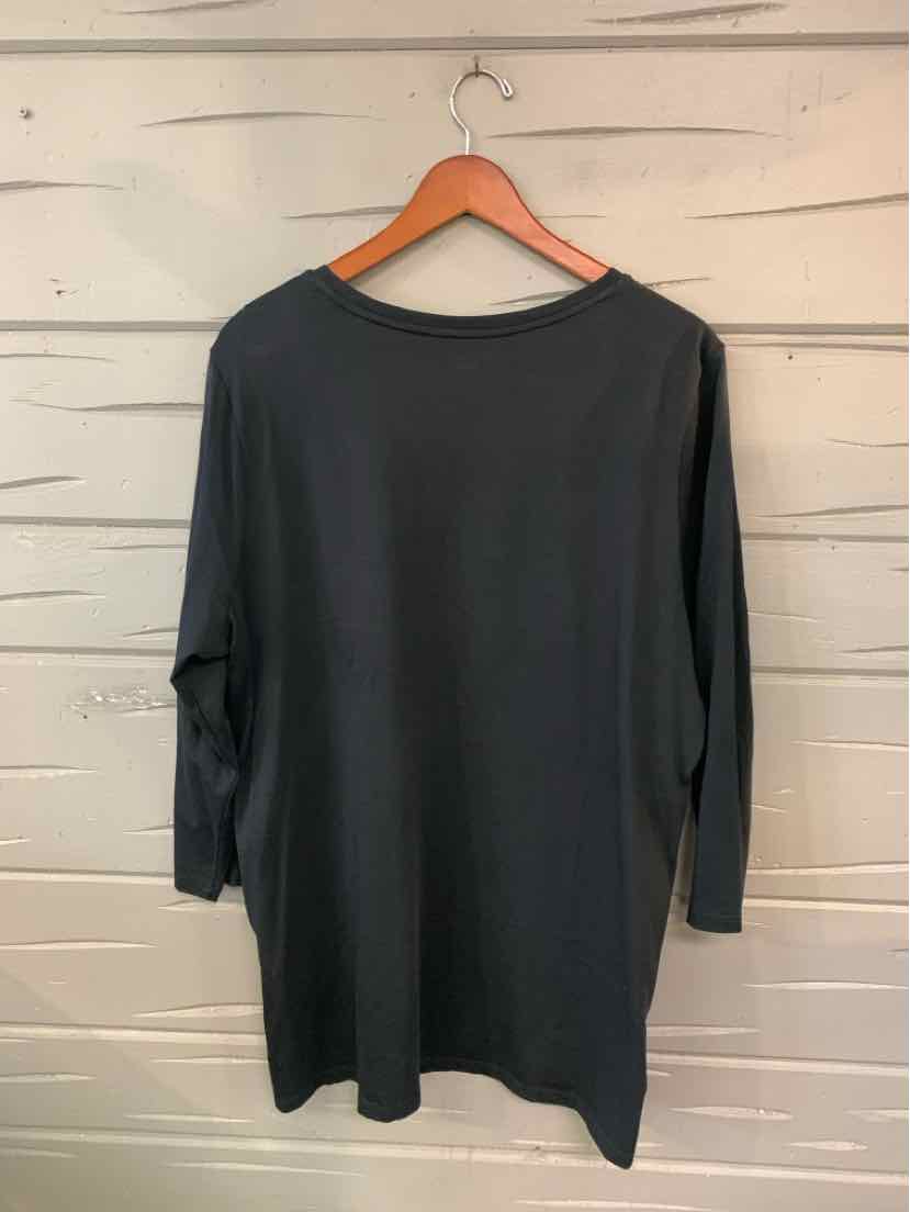 Black long-sleeve women's top with a relaxed fit and round neckline, size XL.
