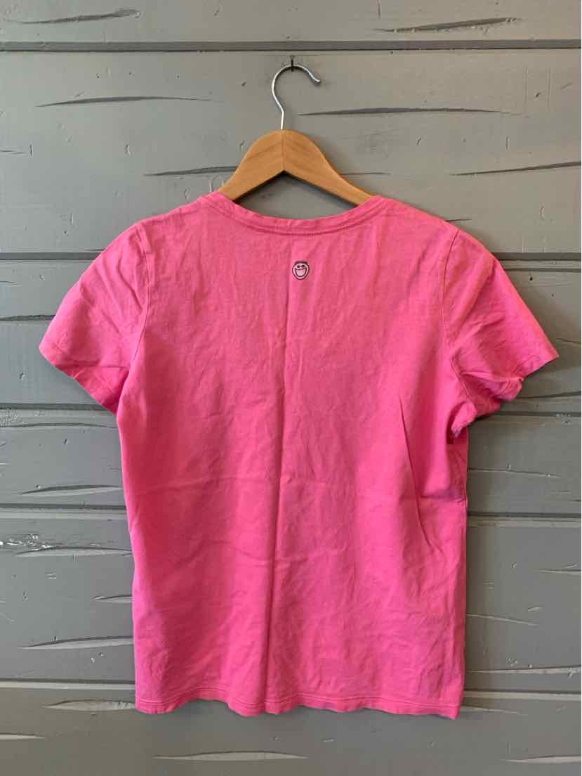 Pink short-sleeve crewneck t-shirt with subtle heather texture hanging on wooden hanger.