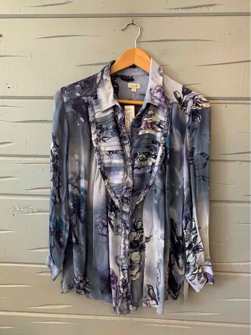 Long-sleeve semi-sheer blouse with ruffled front, gray and black floral print, button cuffs, lightweight fabric.
