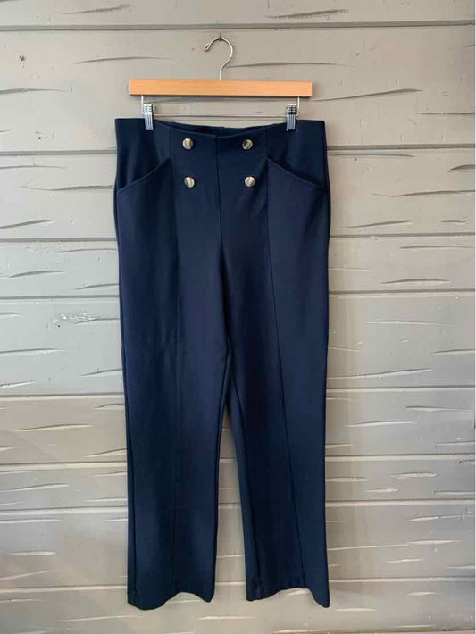 Navy blue high-waisted pants with wide legs and double silver button detailing at the front.